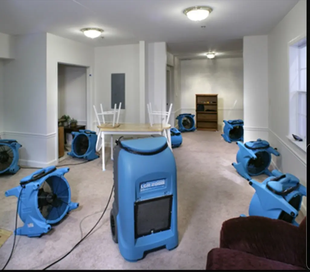 Air movers and dehumidifier setup for Water Damage Restoration in Hamlin